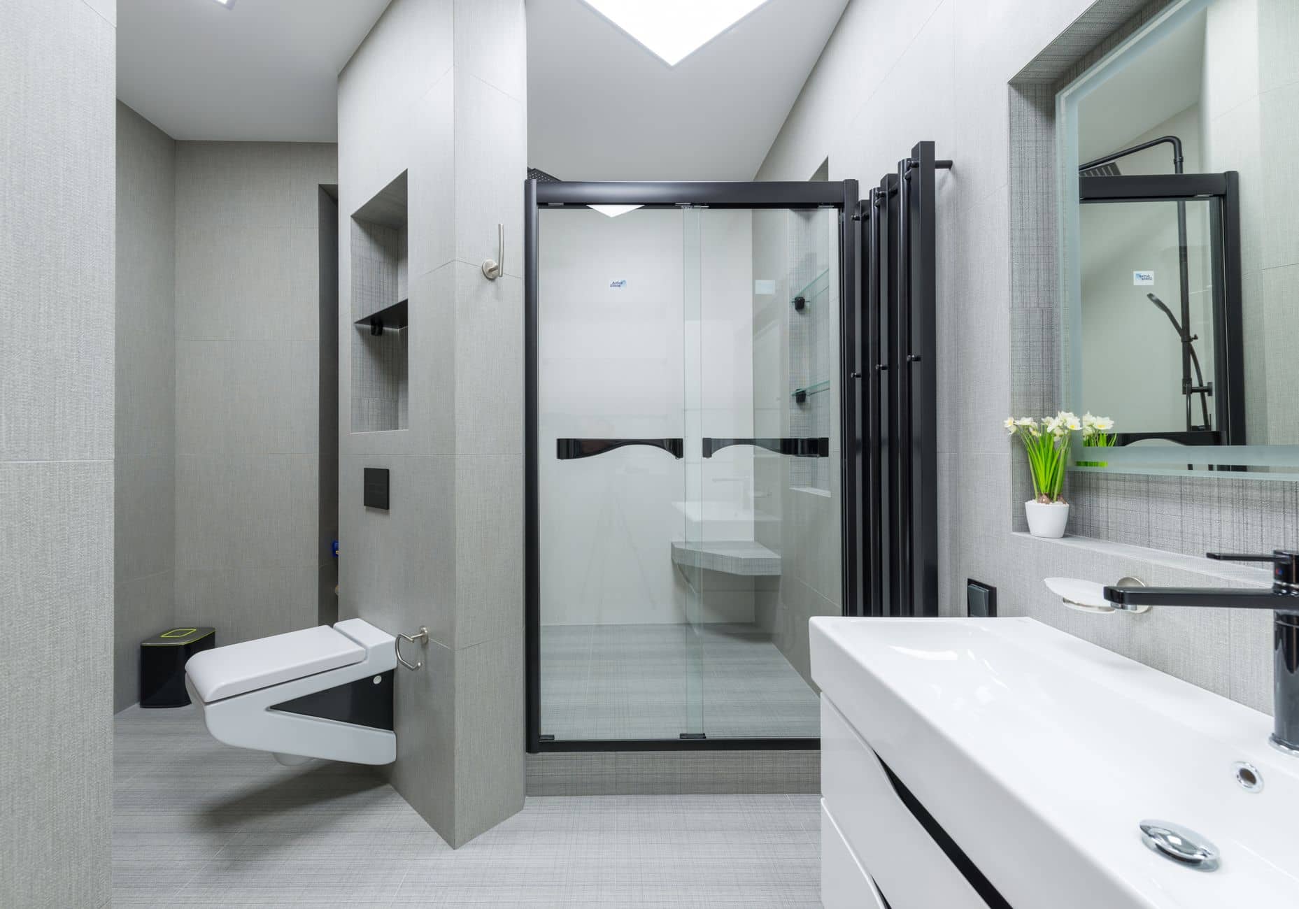 A modern toilet with an electric seat in a warm bathroom