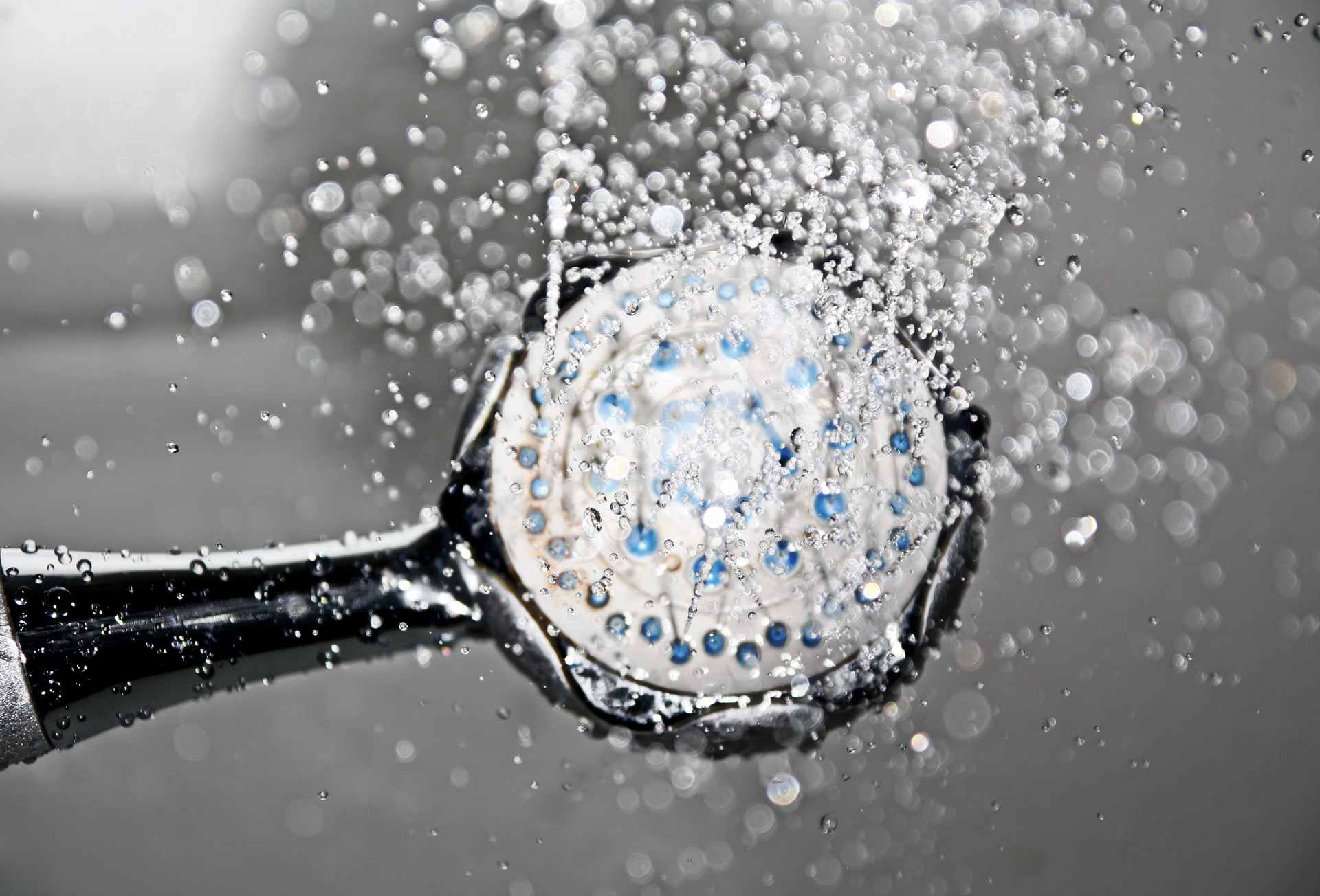Water flowing from a shower head