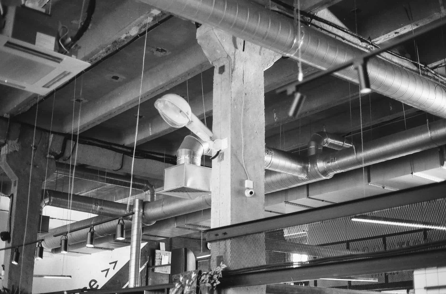 A ceiling exhaust fan grille in a bathroom