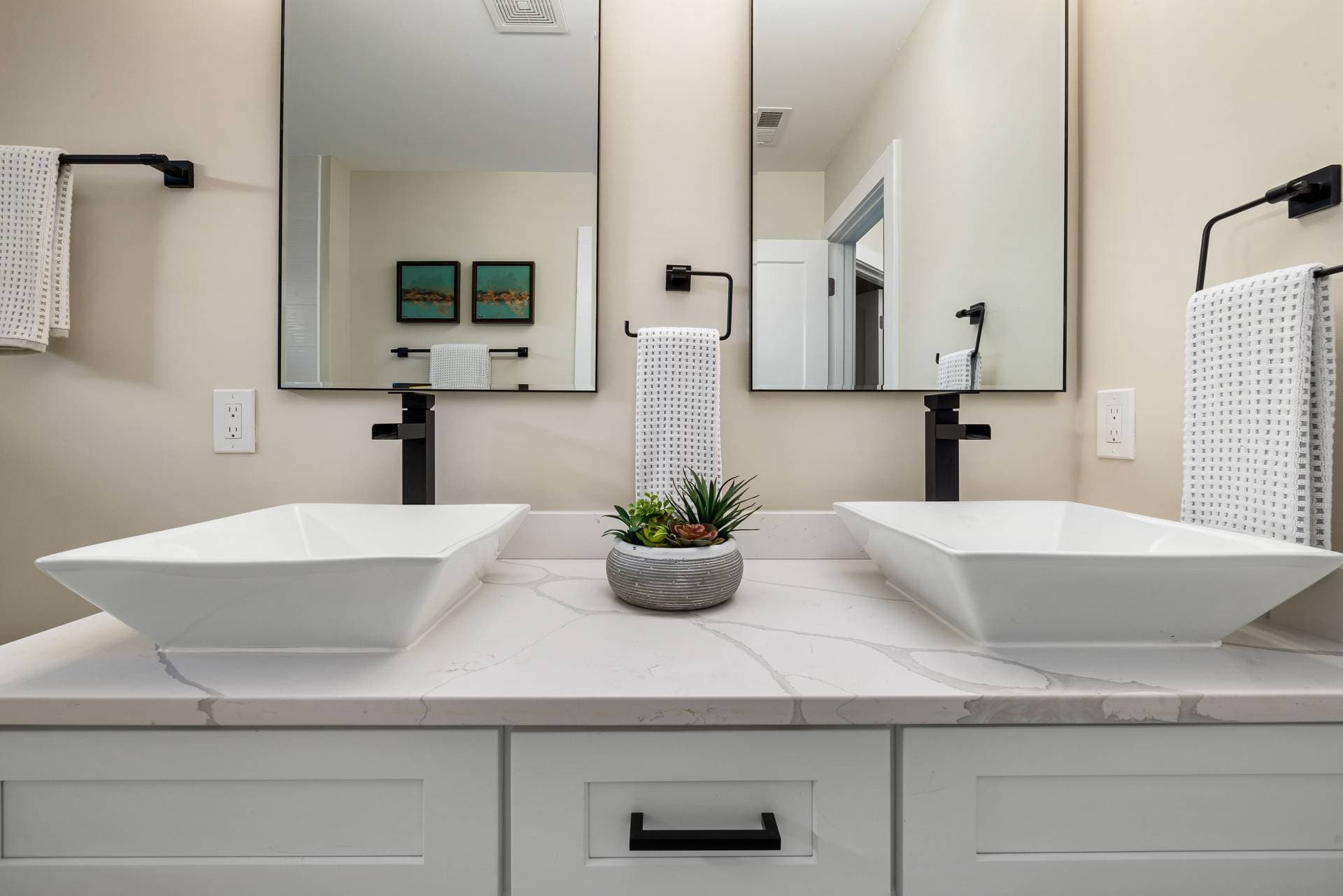 A vessel sink on a bathroom counter