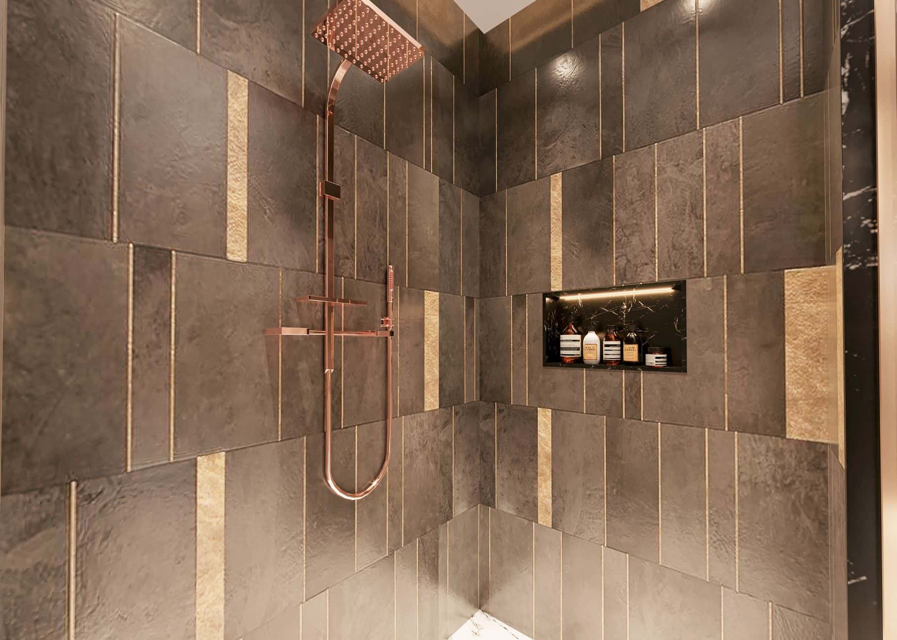 A tiled recessed shower niche holding bottles