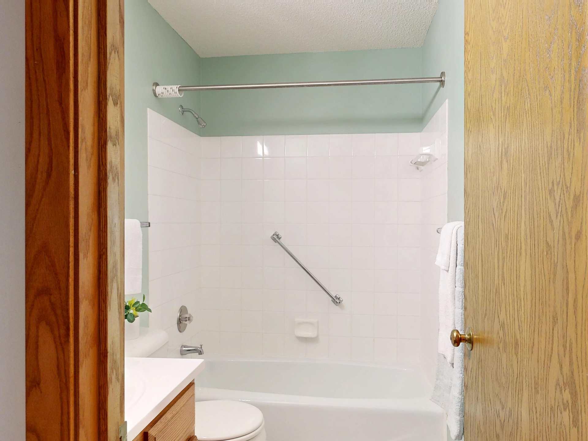 Towels on a bathroom towel bar