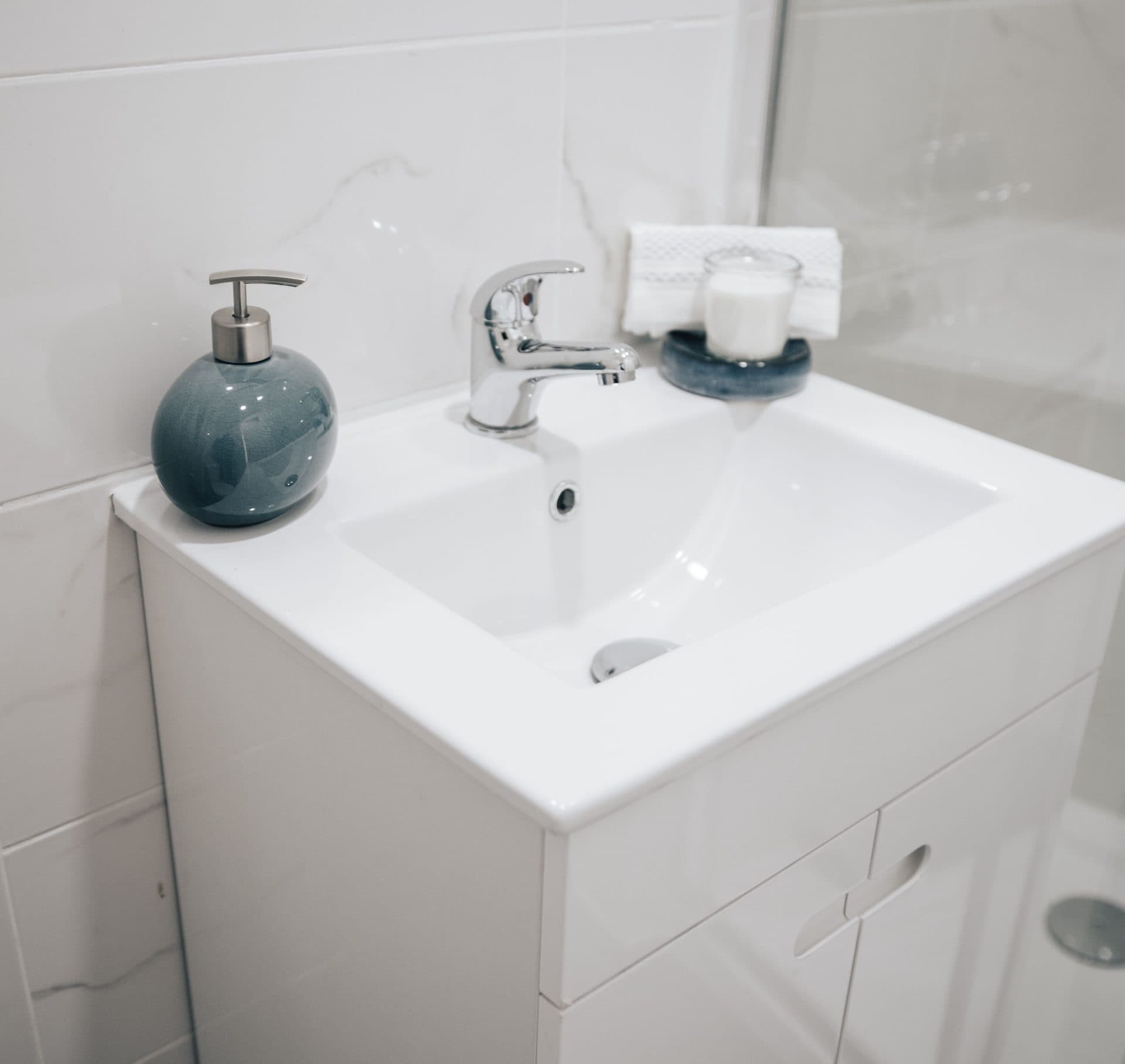 A modern bathroom with a basin and fittings