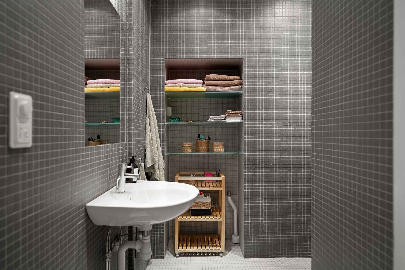 A mirror over a bathroom basin