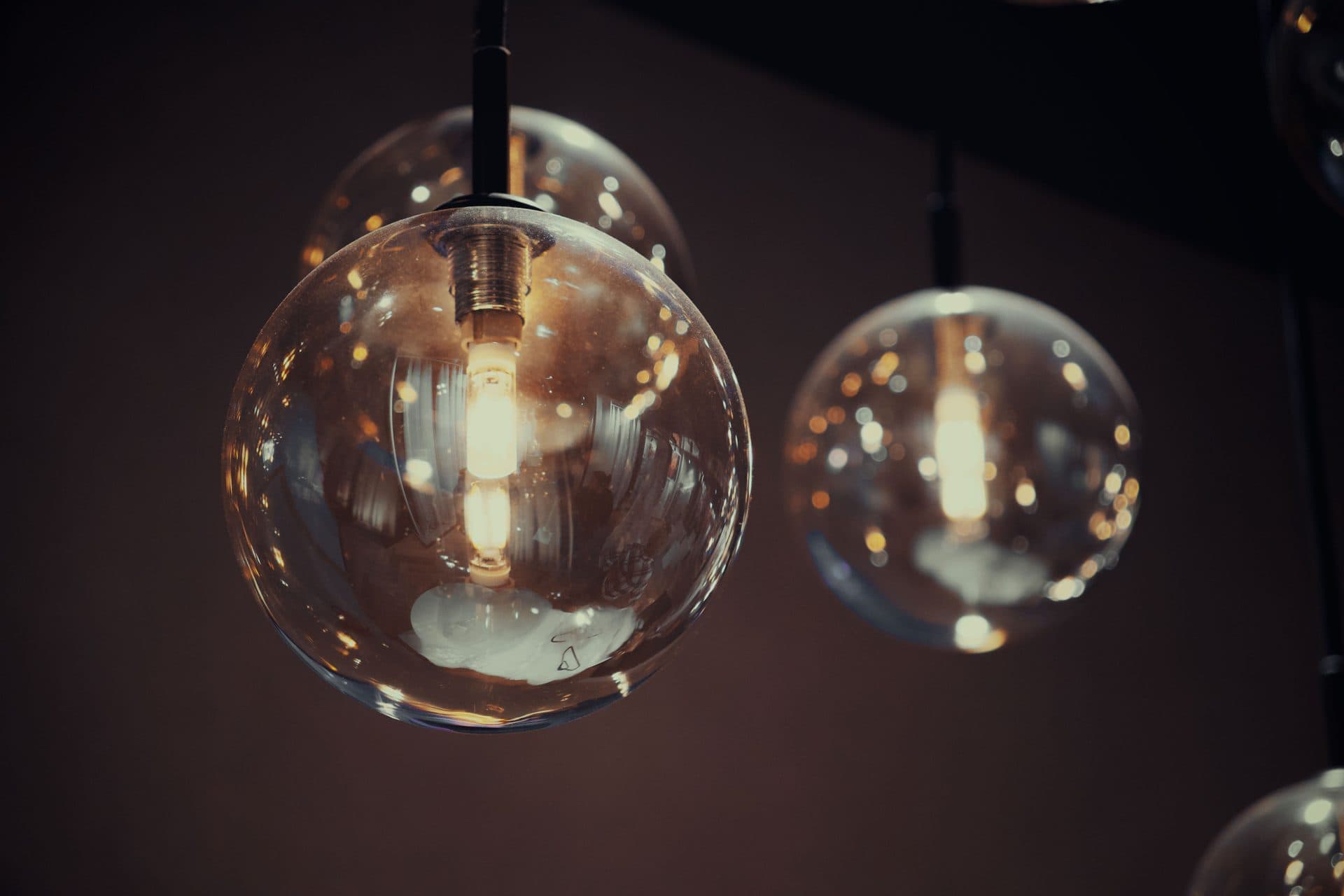 Globe bulbs above a vanity mirror