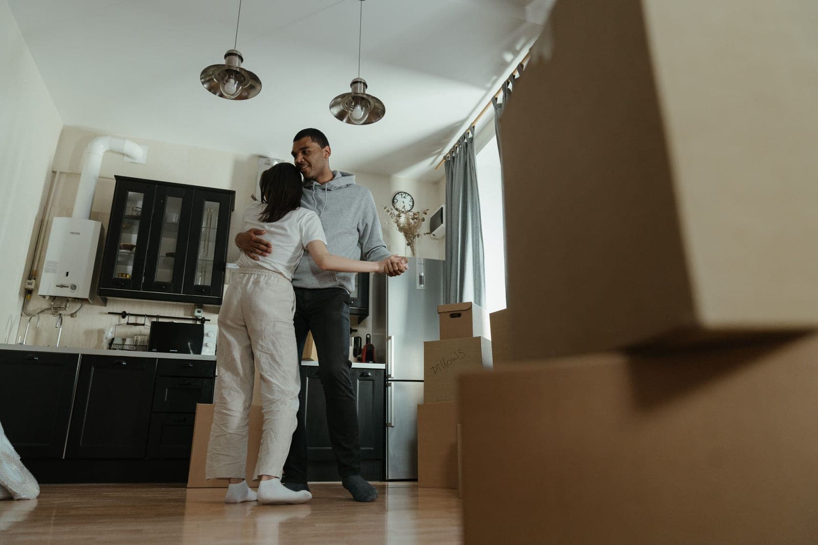 Moving boxes in an empty apartment