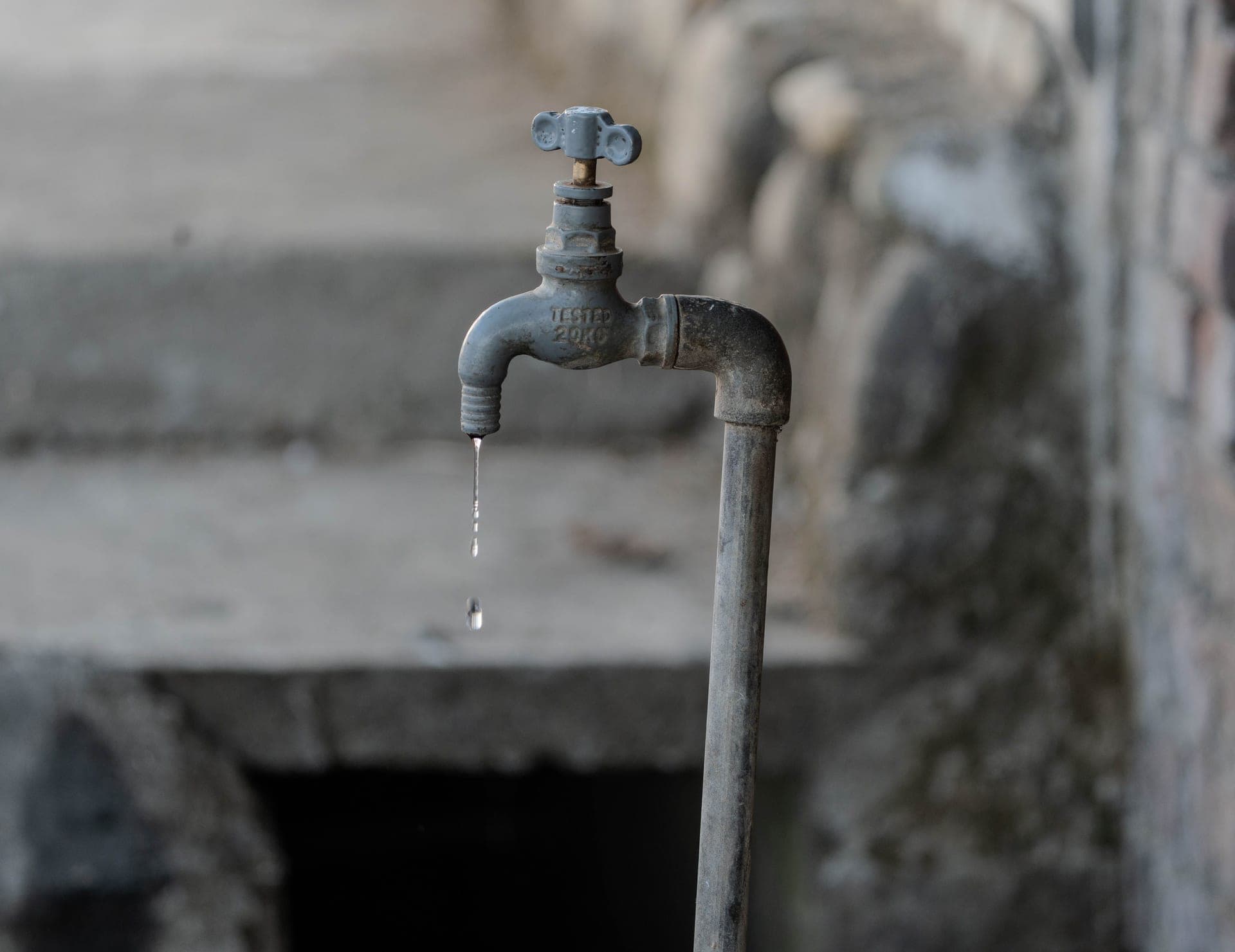 A drop of water falling from a tap
