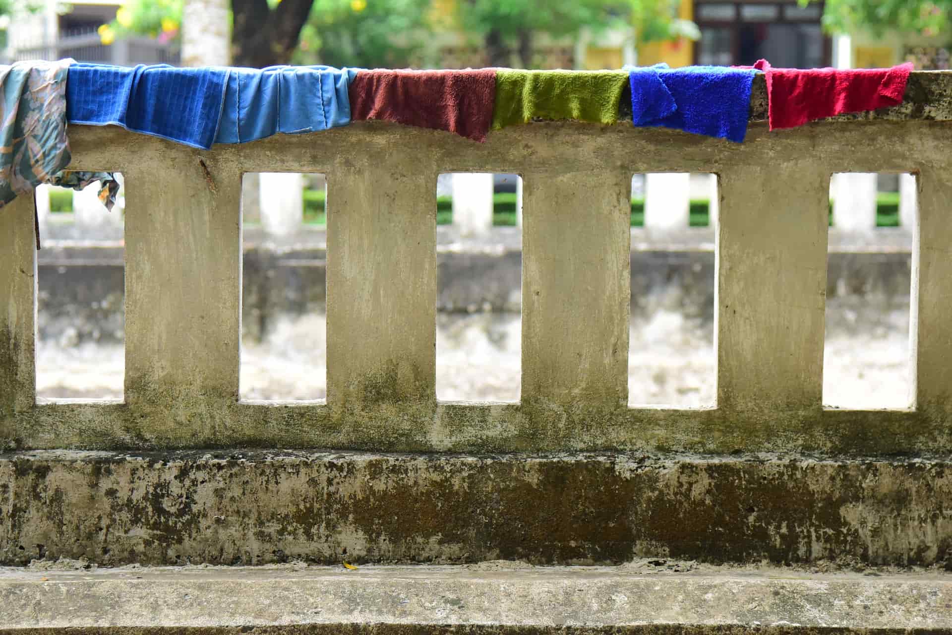 Towels hanging on a rail to dry