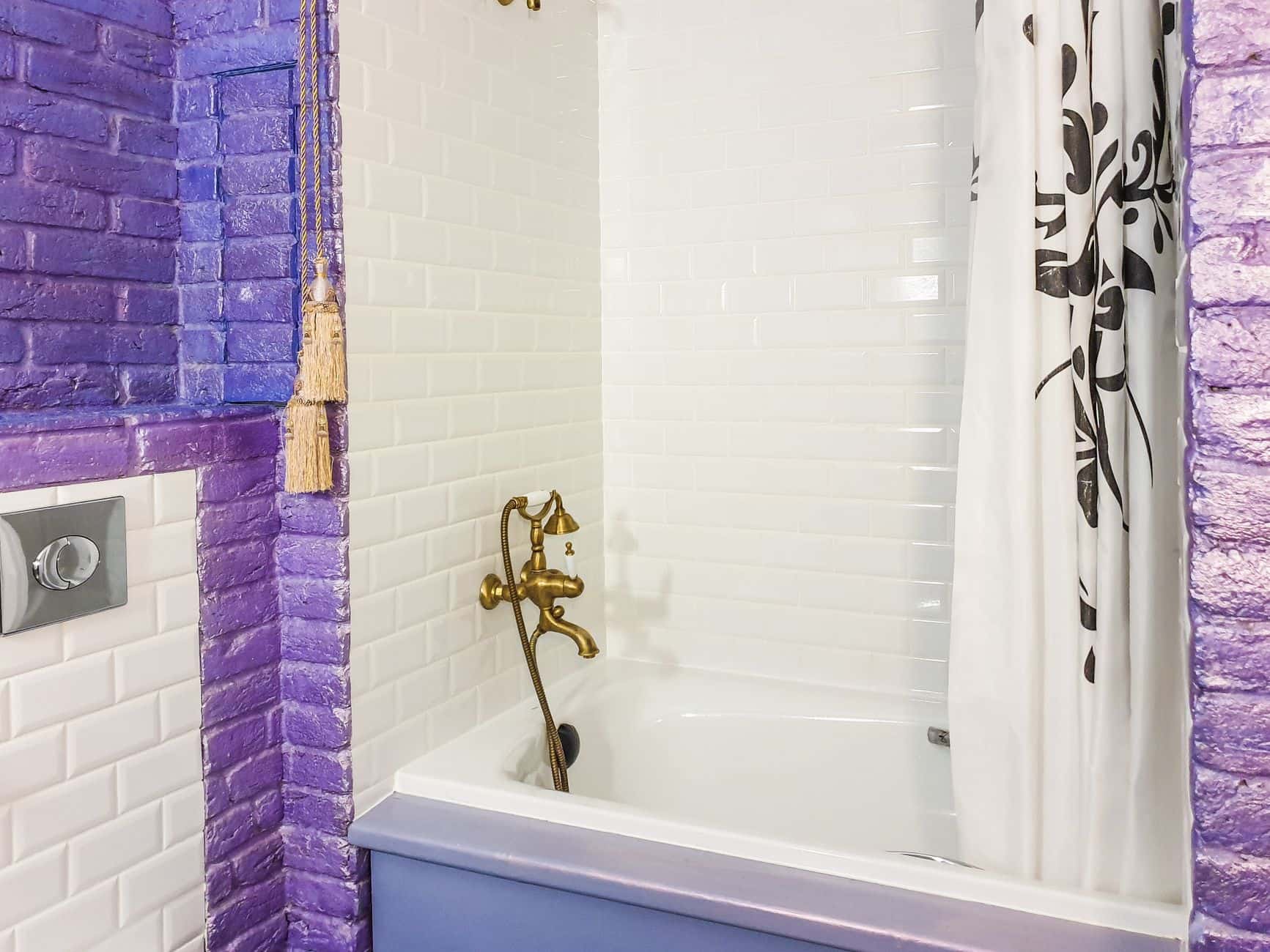 A clear shower curtain liner in a bathtub